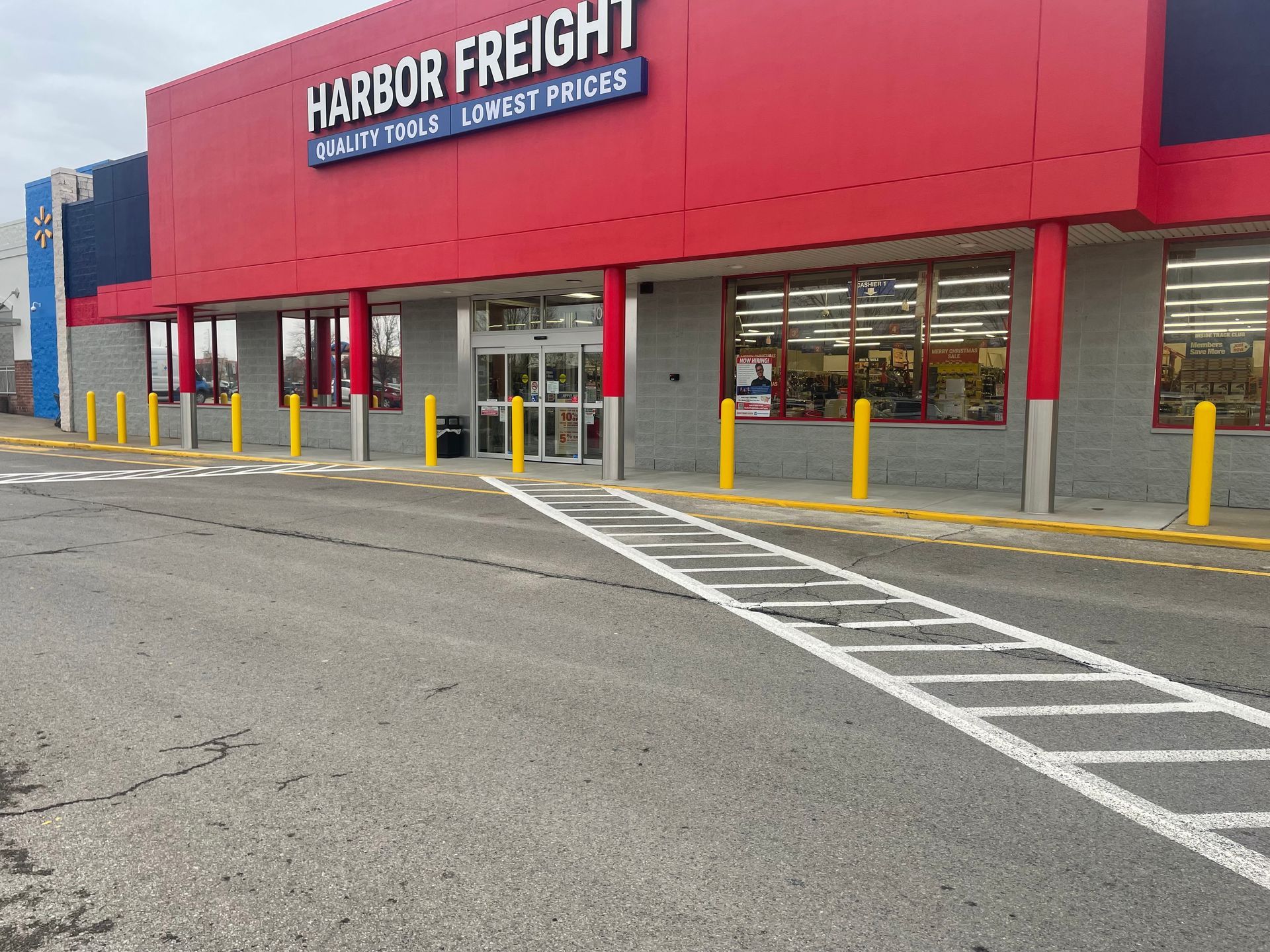 A harbor freight store is located on the side of the road