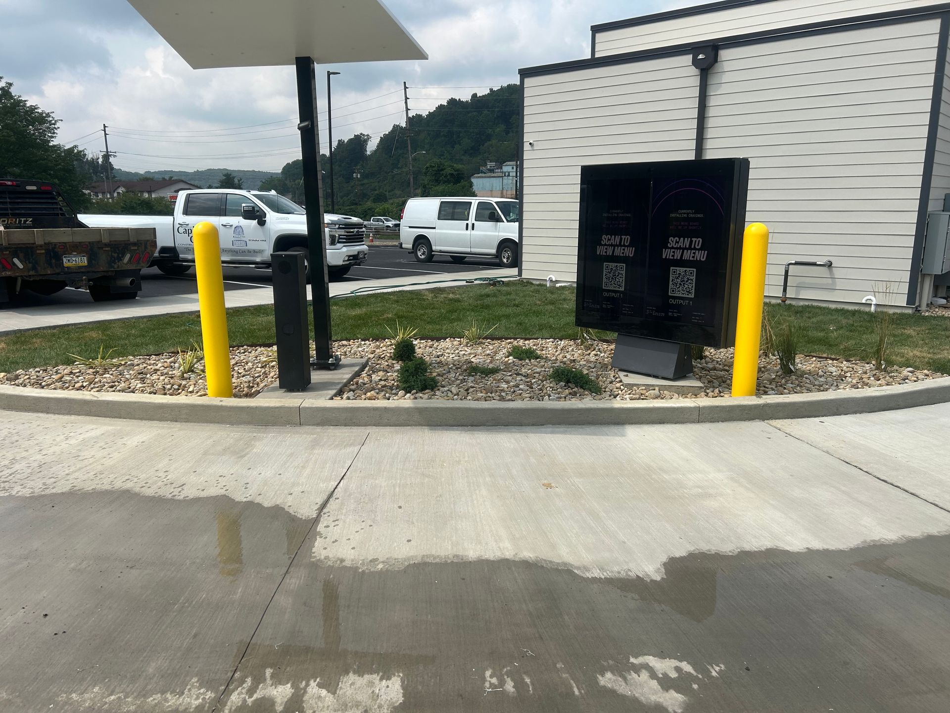 A parking lot with a sign that says ' mcdonald 's ' on it