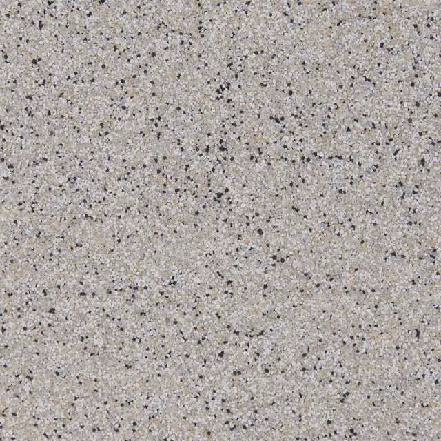 Speckled light gray stone or granite surface with black flecks
