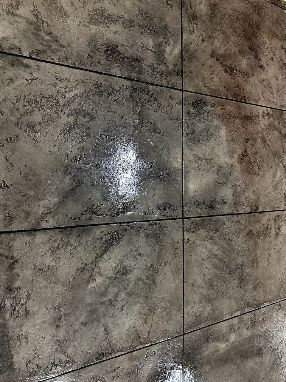 A floor with a concrete overlay