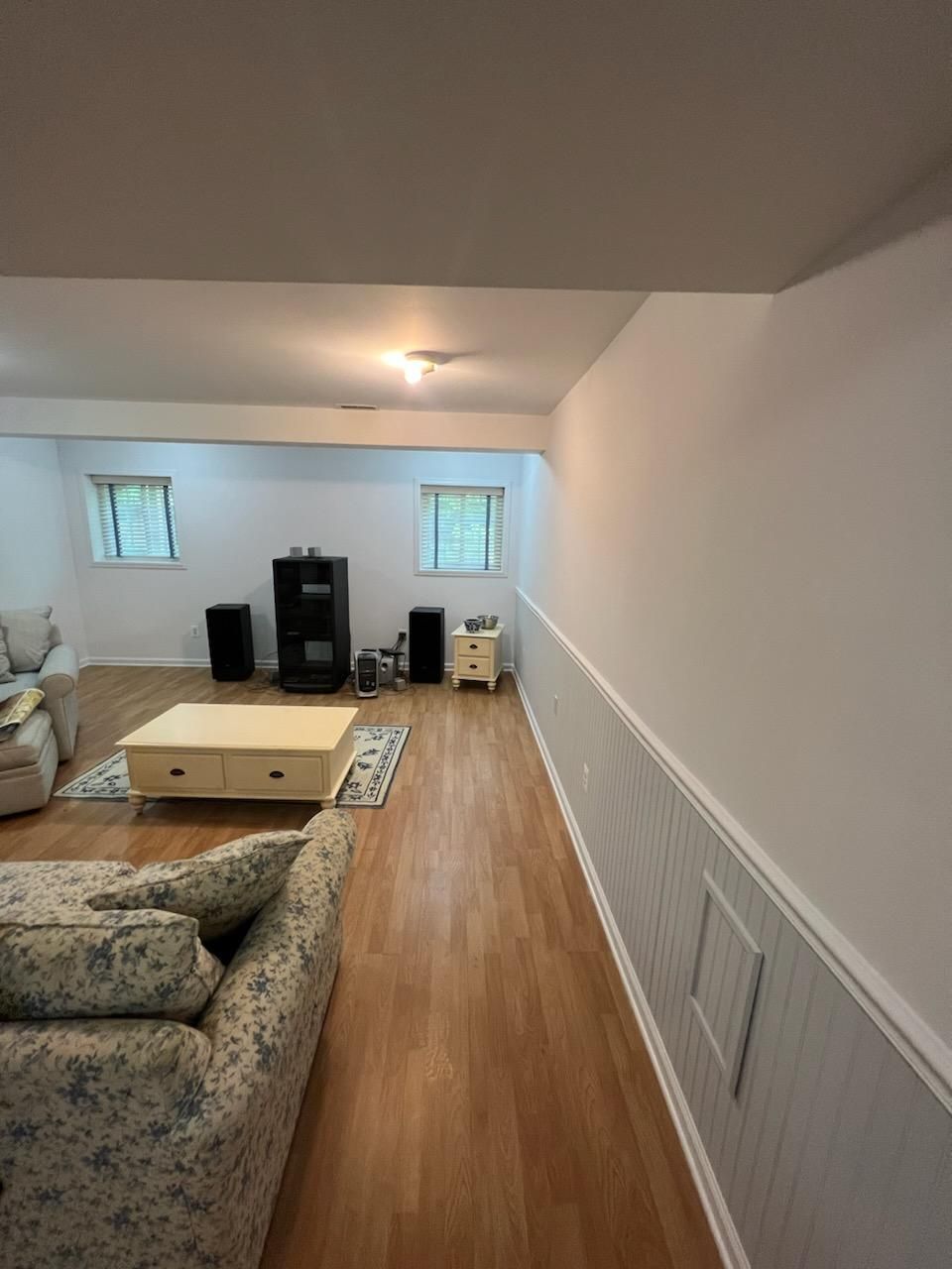A living room with a couch and a coffee table