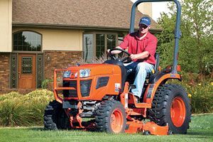 Man driving lawn tractor