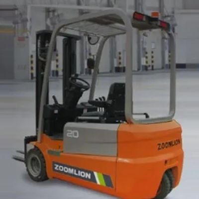 Orange Zoomlion forklift in a warehouse, shown from the rear-left side.