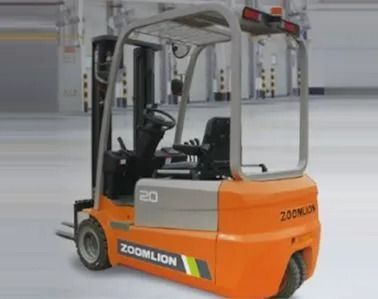 Orange Zoomlion forklift parked indoors on a warehouse floor