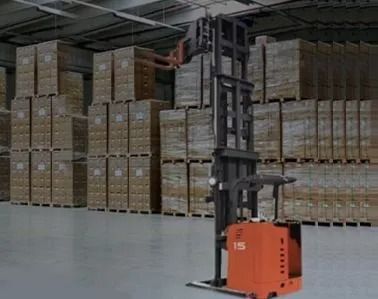 Orange forklift in a warehouse aisle stacked with boxed pallets