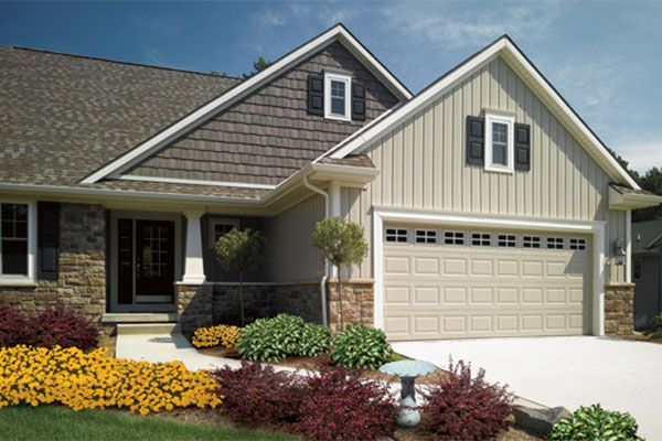 A large house with a large garage door