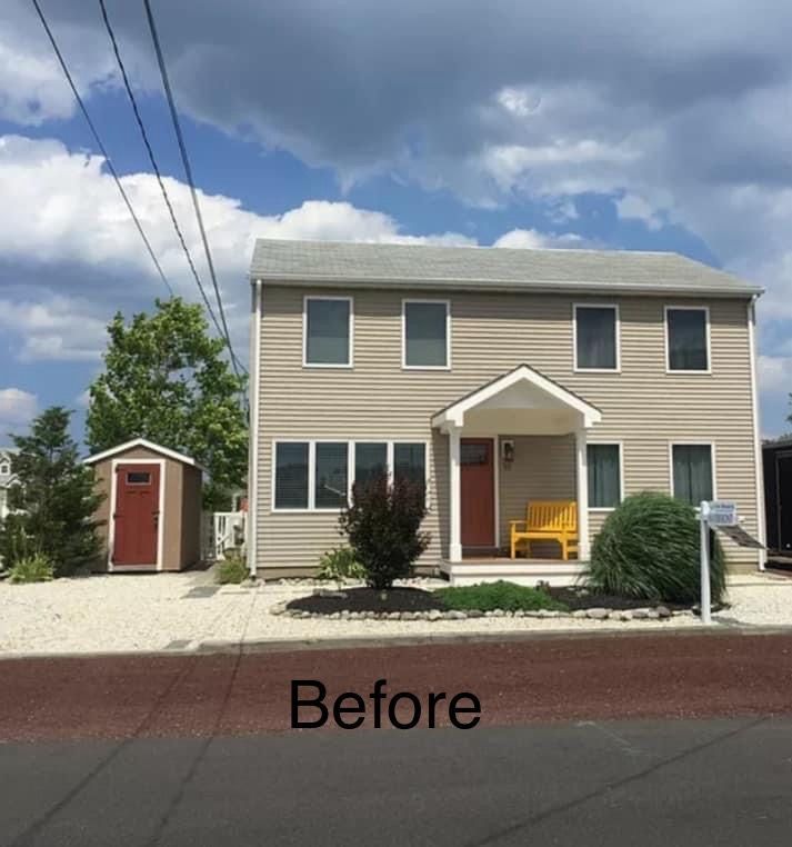 a before picture of a house with a picnic table and chairs