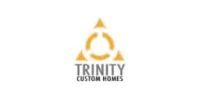 Trinity Custom Homes logo with gold triangular icon and gray text on white background