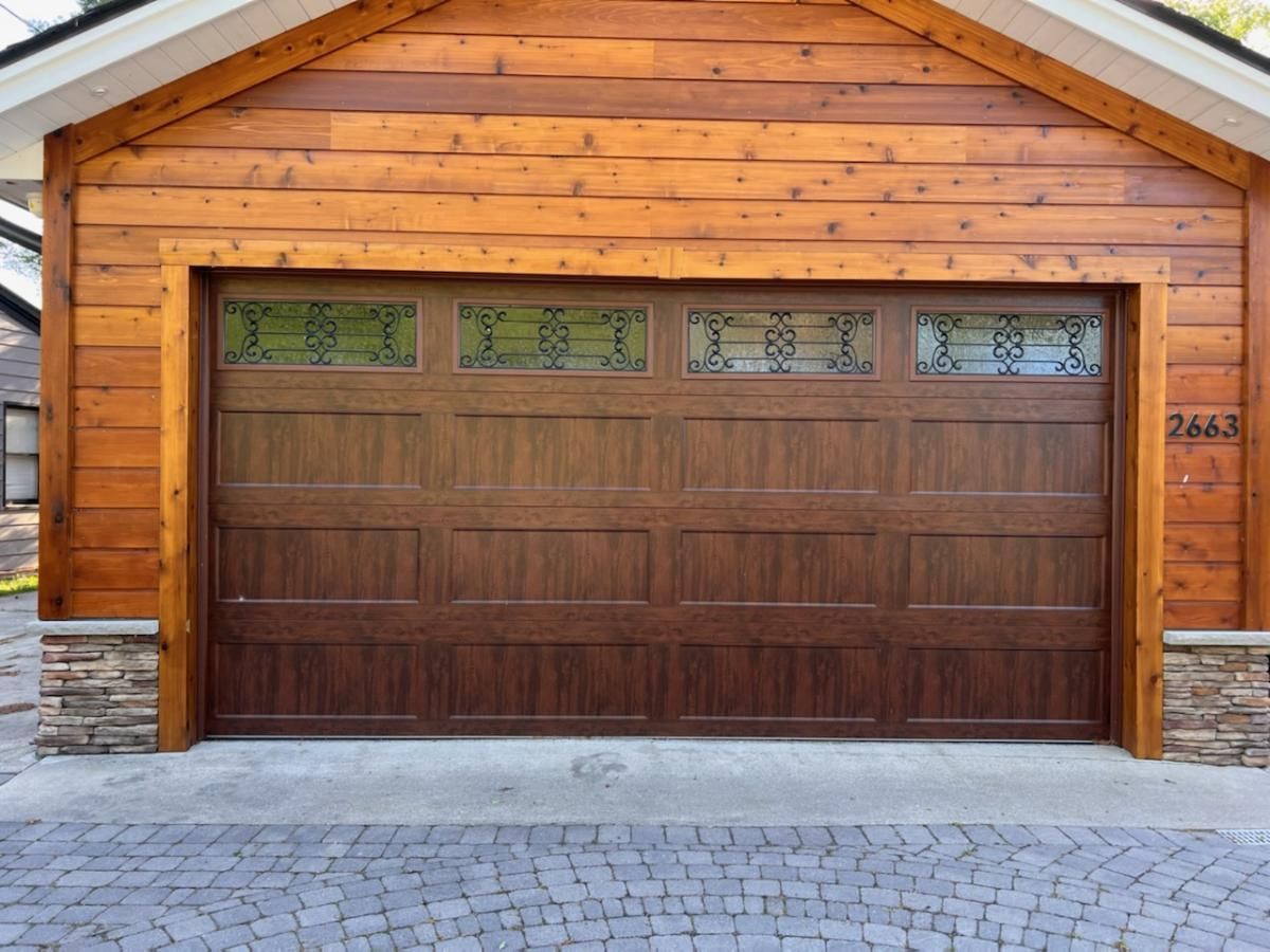 A wooden garage door with the number 2643 on it
