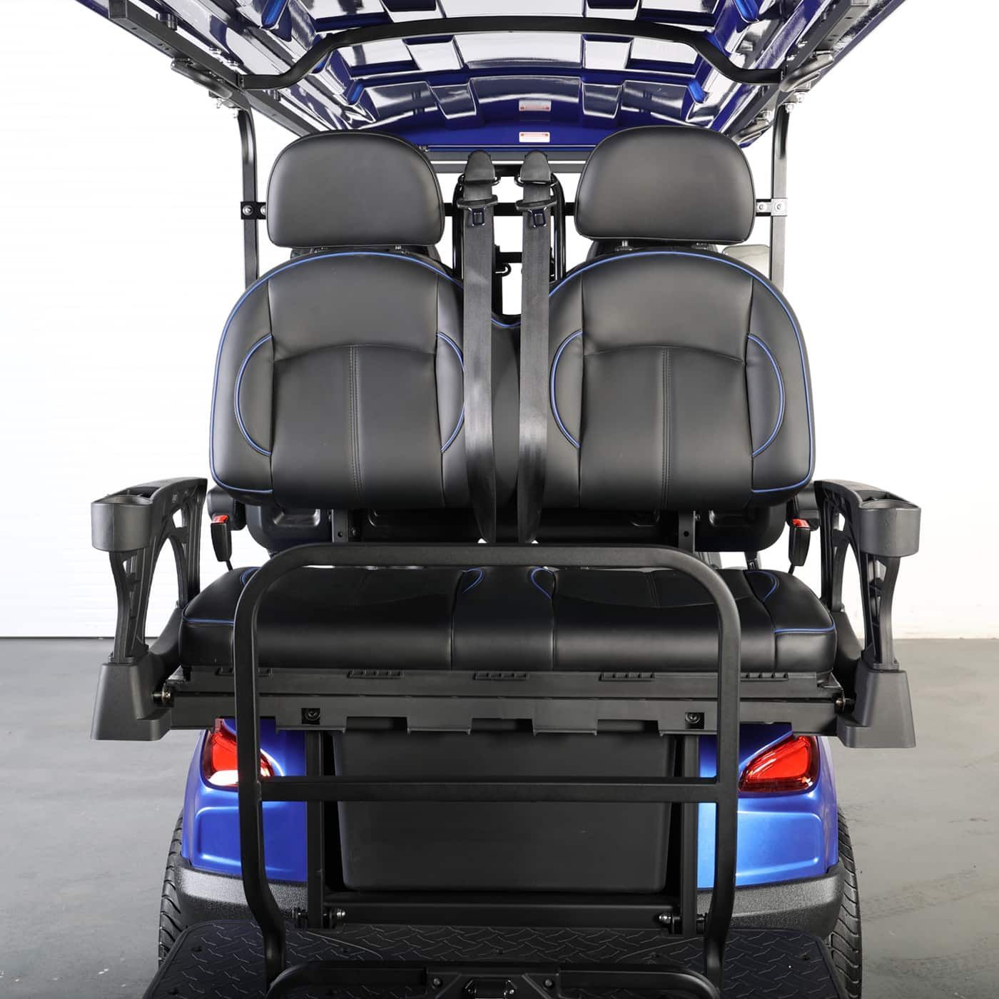 The back of a blue golf cart with black seats