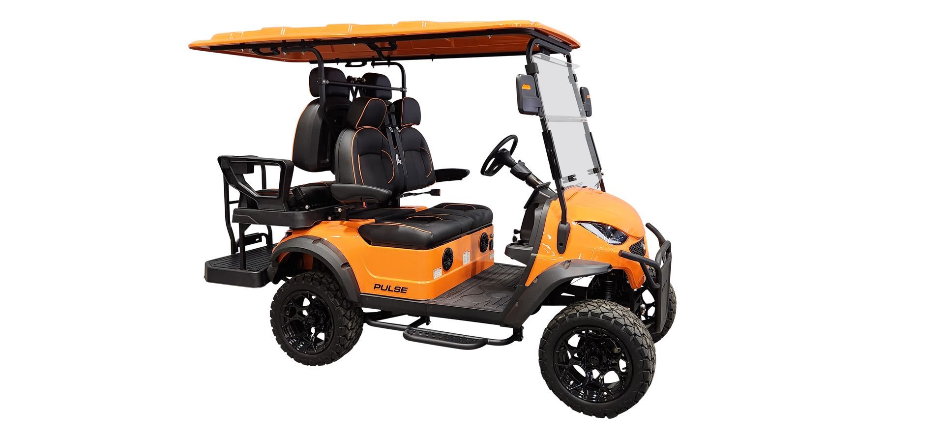 An orange golf cart with a canopy on top of it on a white background.