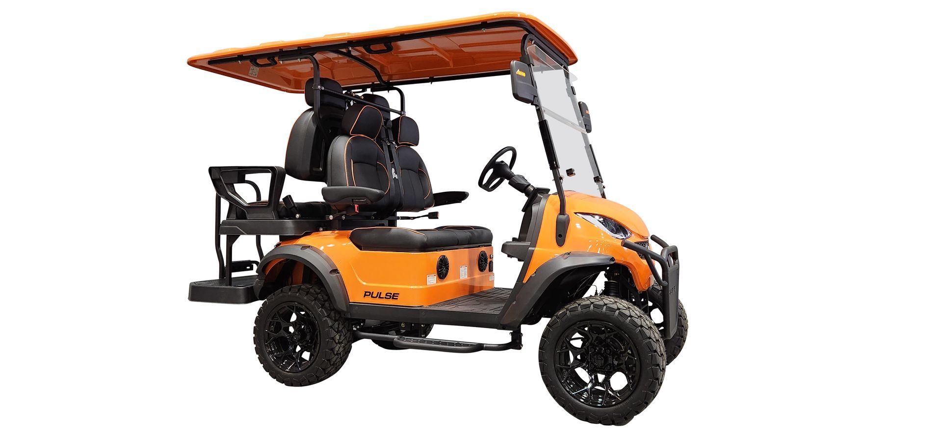 An orange golf cart with a canopy on top of it on a white background.