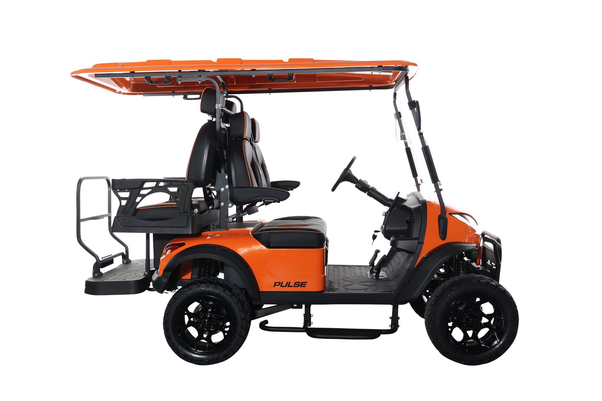 An orange golf cart with a canopy on top of it on a white background.