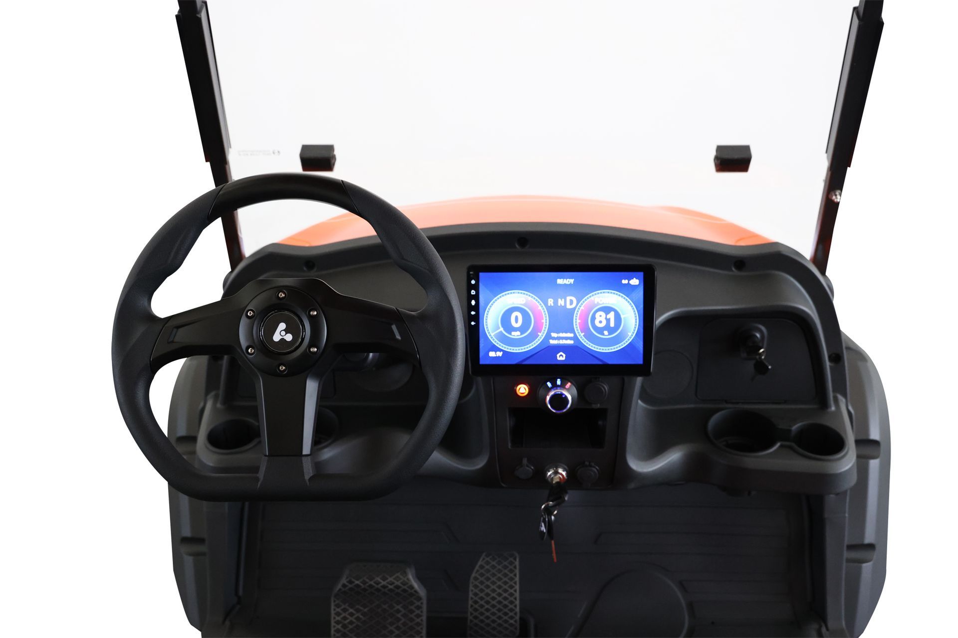 The interior of a golf cart with a steering wheel and dashboard.