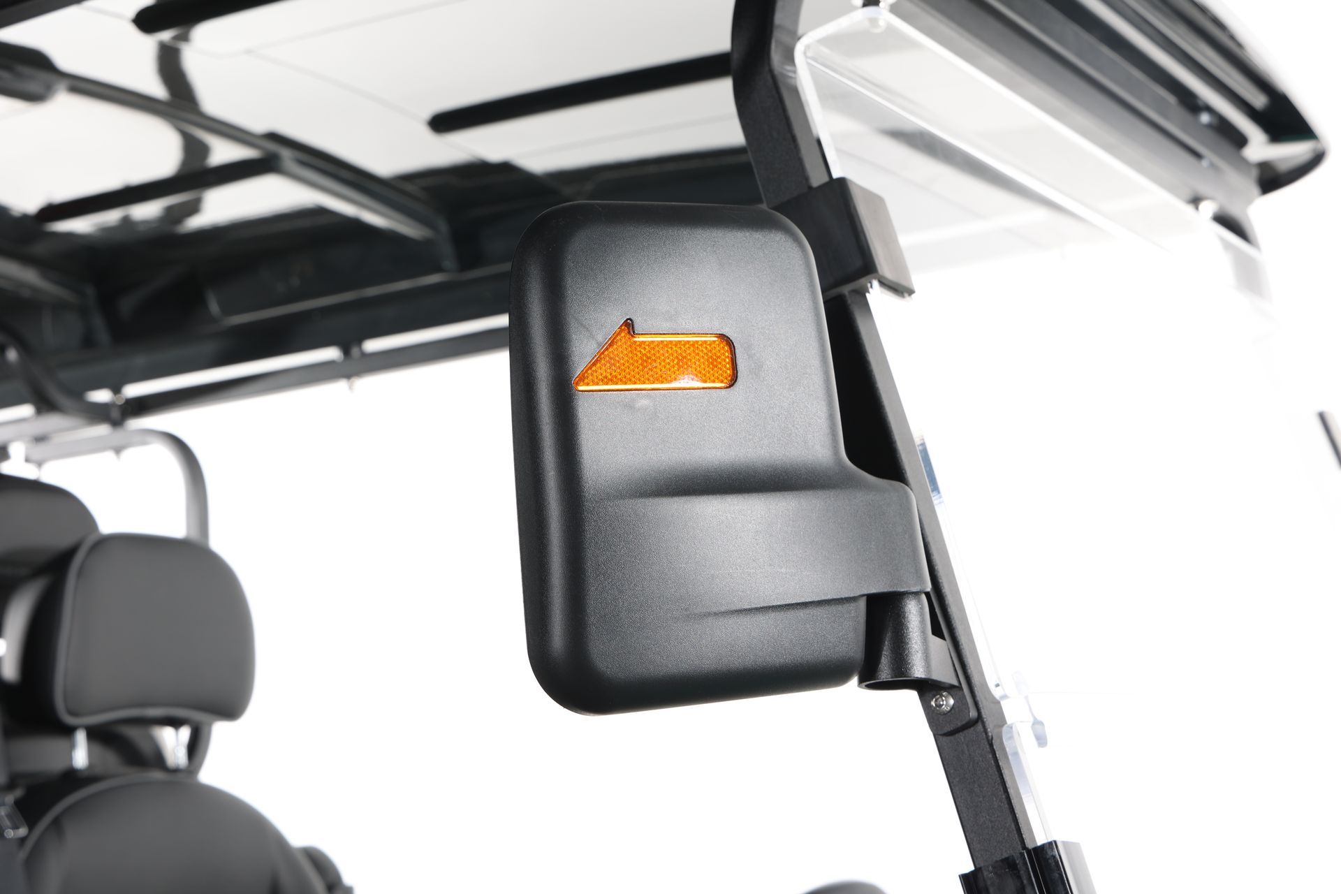 A close up of a rear view mirror on a golf cart.