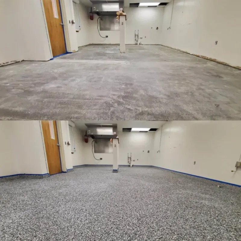 Empty garage interior with bare concrete floor above and speckled epoxy floor below, both with white walls.