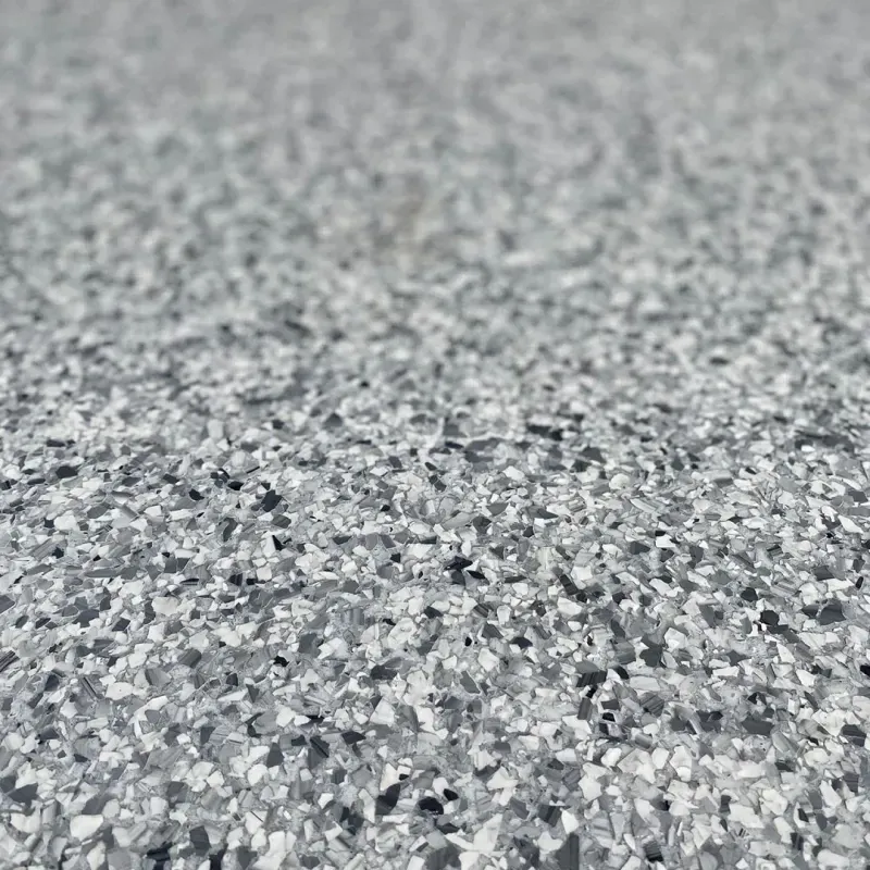 Close-up of a gray speckled stone or terrazzo surface