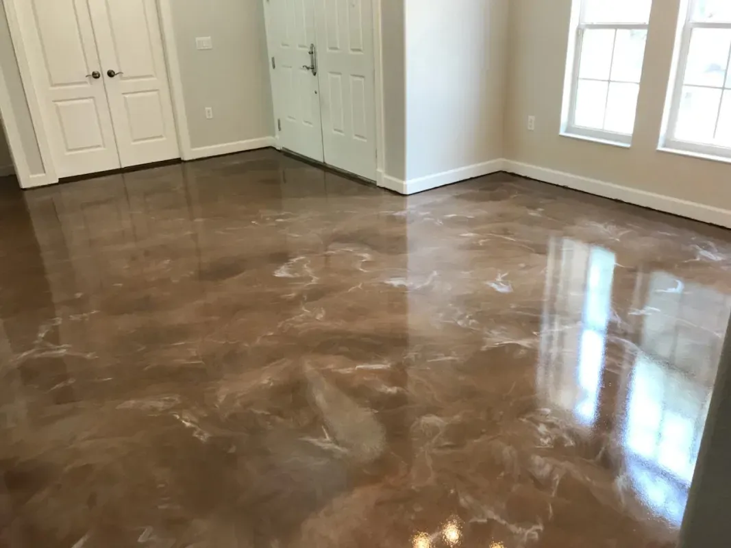 Empty room with glossy brown concrete floor and sunlight from a window