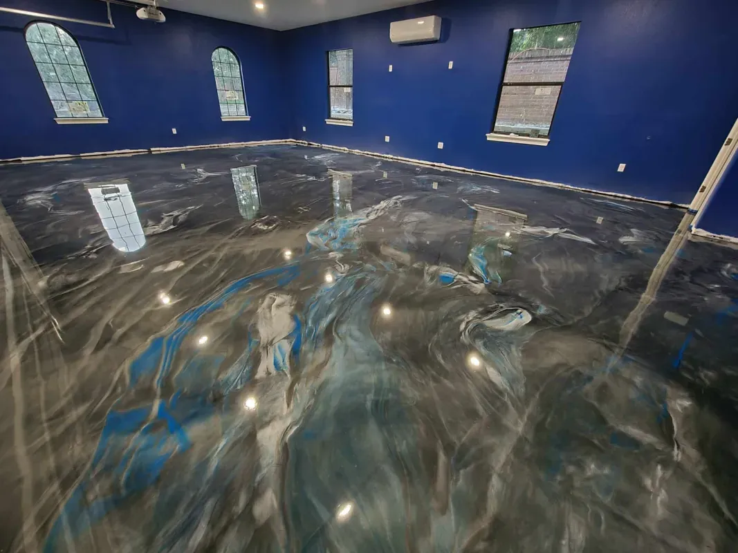 Empty blue room with glossy reflective floor and arched windows