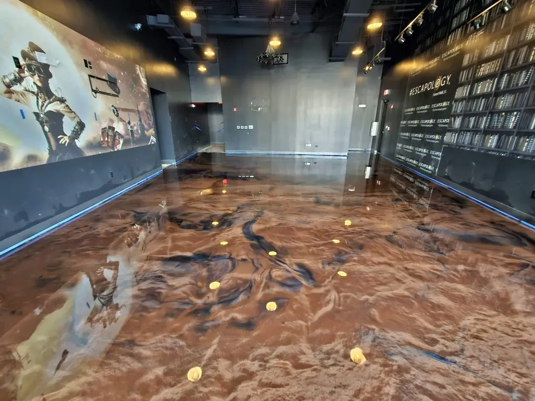 Modern art gallery with glossy abstract floor, mural walls, and overhead track lighting
