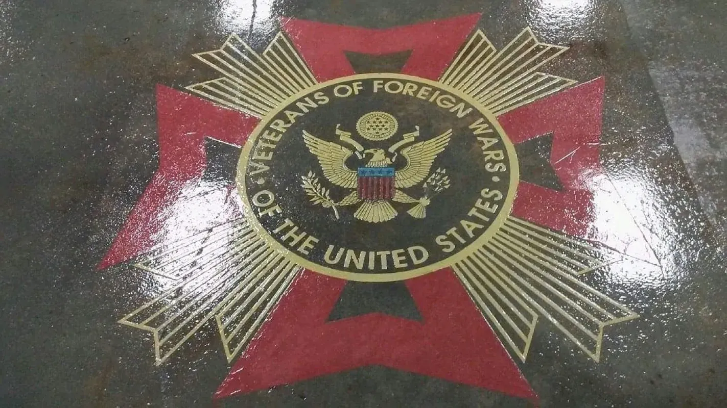 U.S. Department of Veterans Affairs seal on a dark surface with a red star and gold lettering