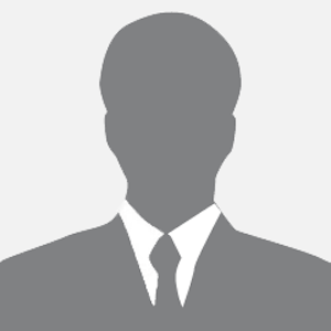 Silhouette of a person wearing a suit and tie, typically used as a placeholder for a profile picture.