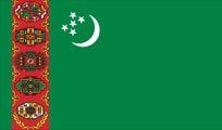 The flag of Turkmenistan. Green field with a white crescent and five stars; a red vertical stripe featuring carpet patterns.