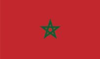 Red flag with a green, five-pointed star at its center, representing Morocco.