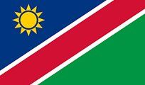 Flag of Namibia: blue triangle with a yellow sun, diagonal red and white stripe, and a green lower right quadrant.