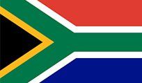 Flag of South Africa with red, white, blue, green, black, and yellow stripes and shapes.
