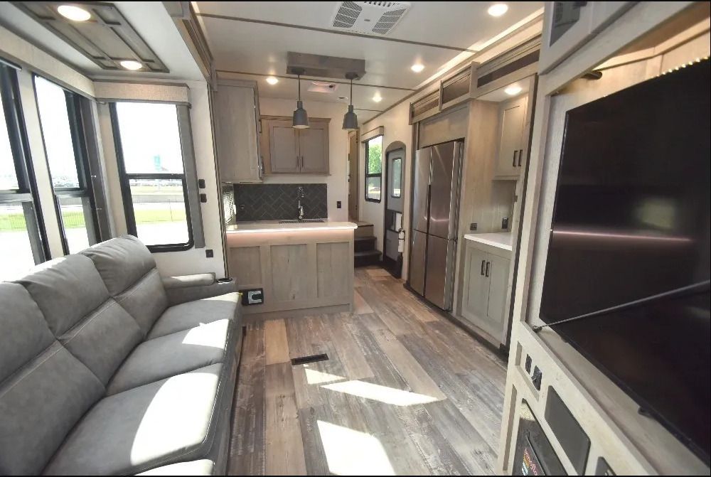 A living room with a couch and a television