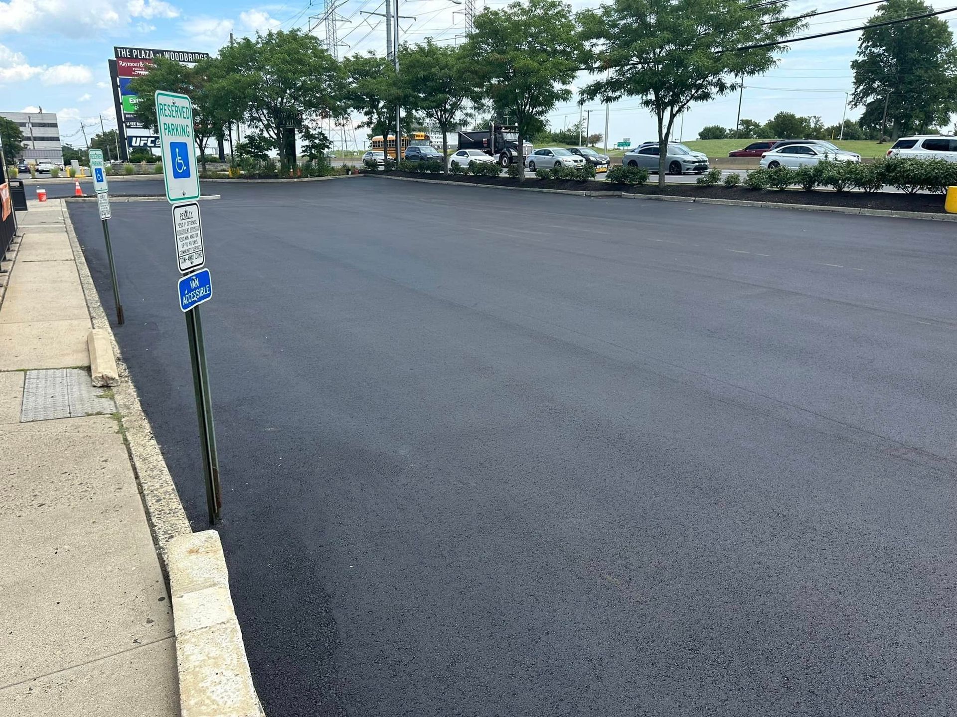 A parking lot with a lot of cars parked in it.