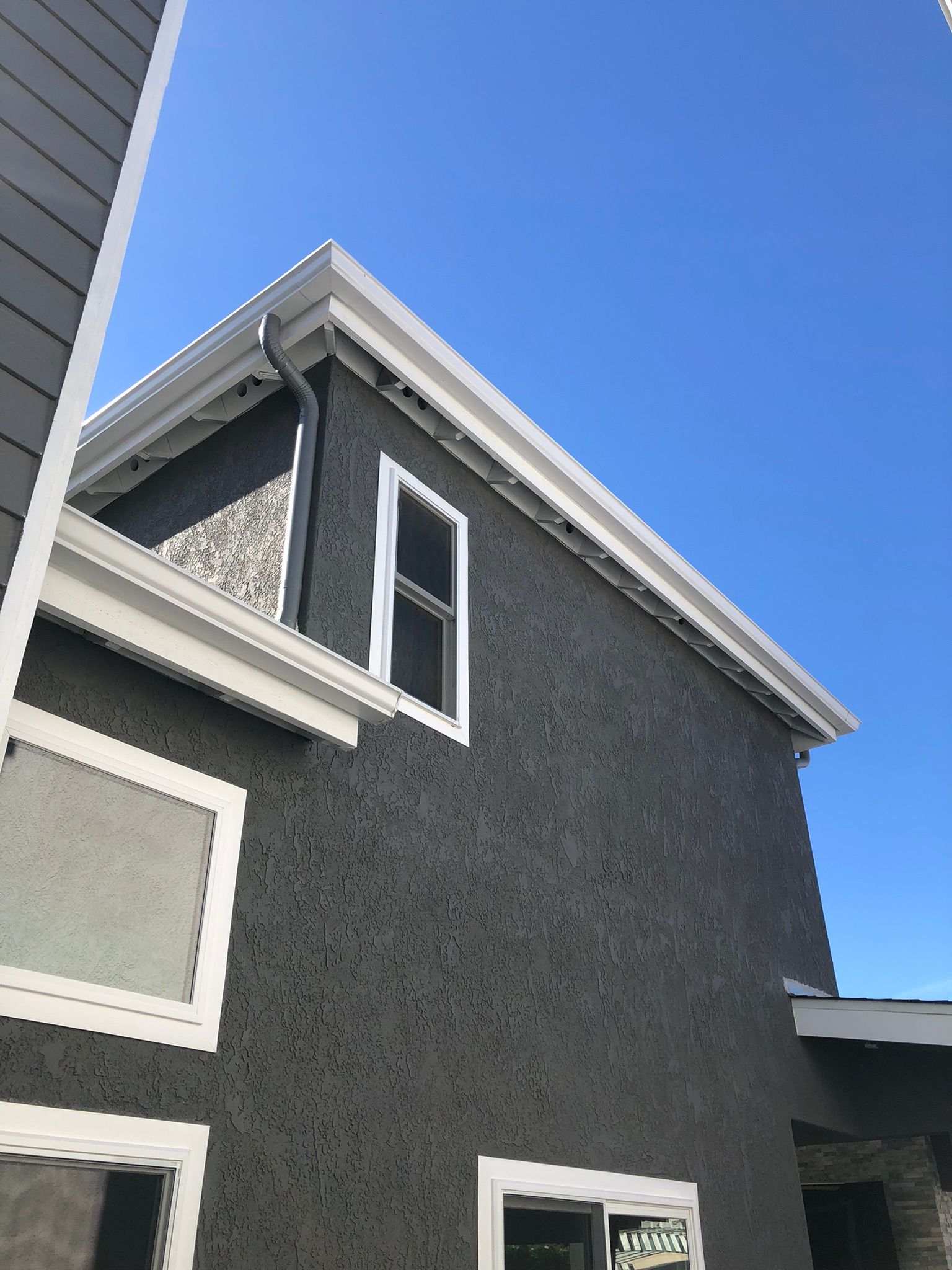 A house with a sign that says ' a ' on it
