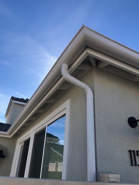 The number 11 is on the side of a house