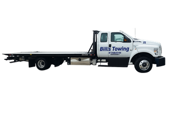 White tow truck with the name