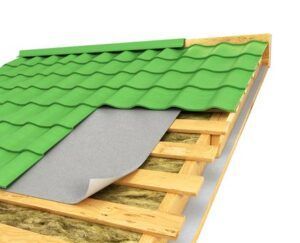 Partially installed green roof shingles with exposed underlayment and wooden roof slats