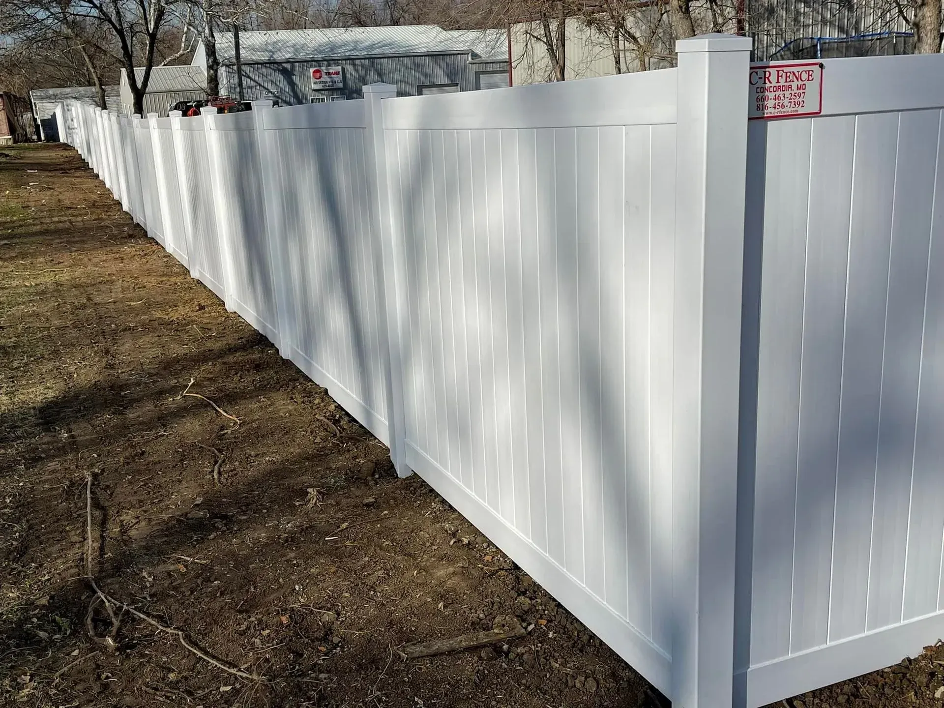 White vinyl fence
