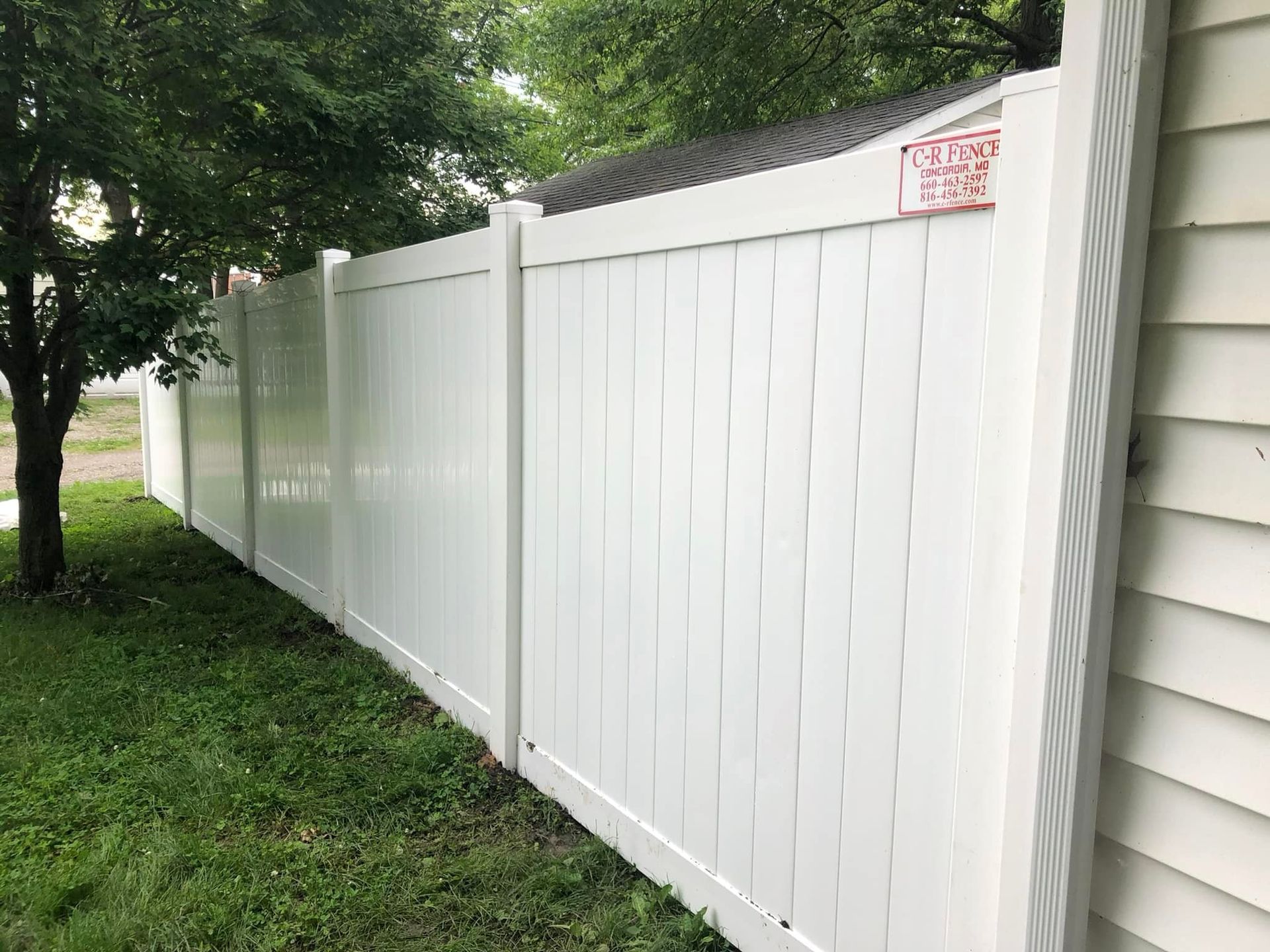 Solid white vinyl fence