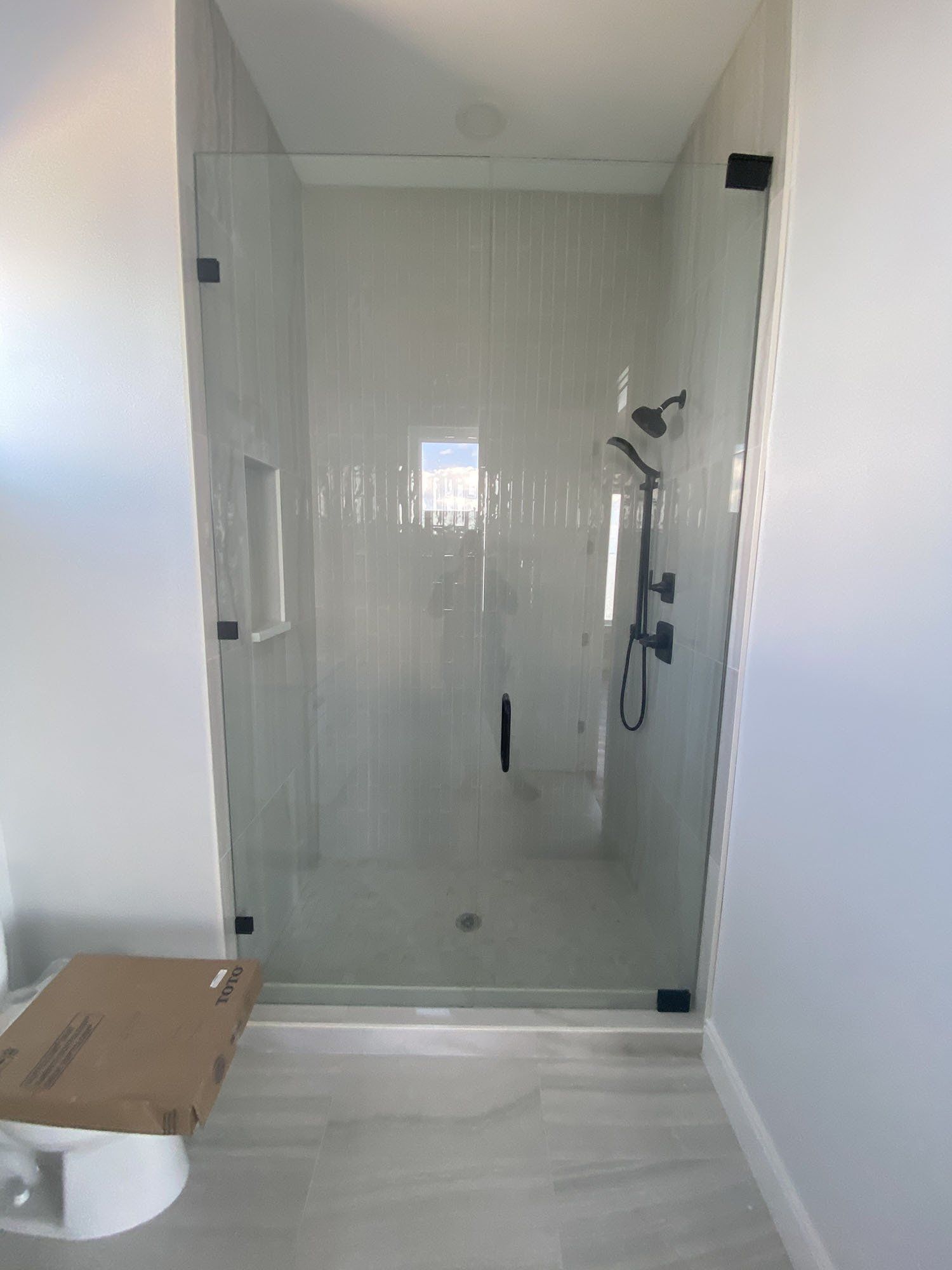 Frameless shower door