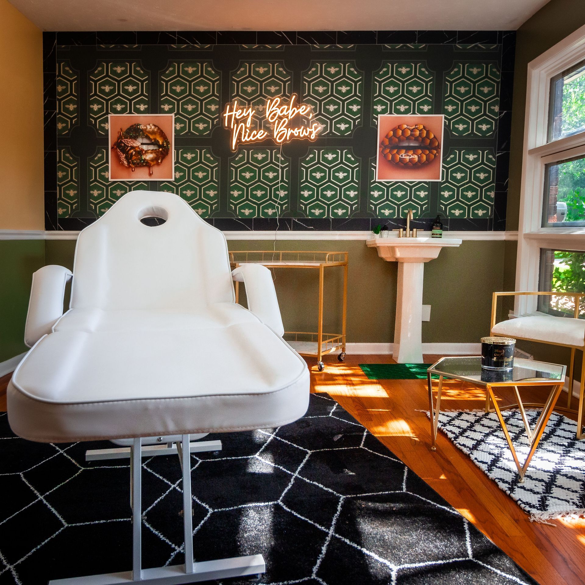 A room with a chair and a sign that says