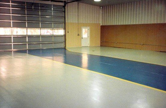 shotblasted concrete floor with epoxy coating and traffic lines