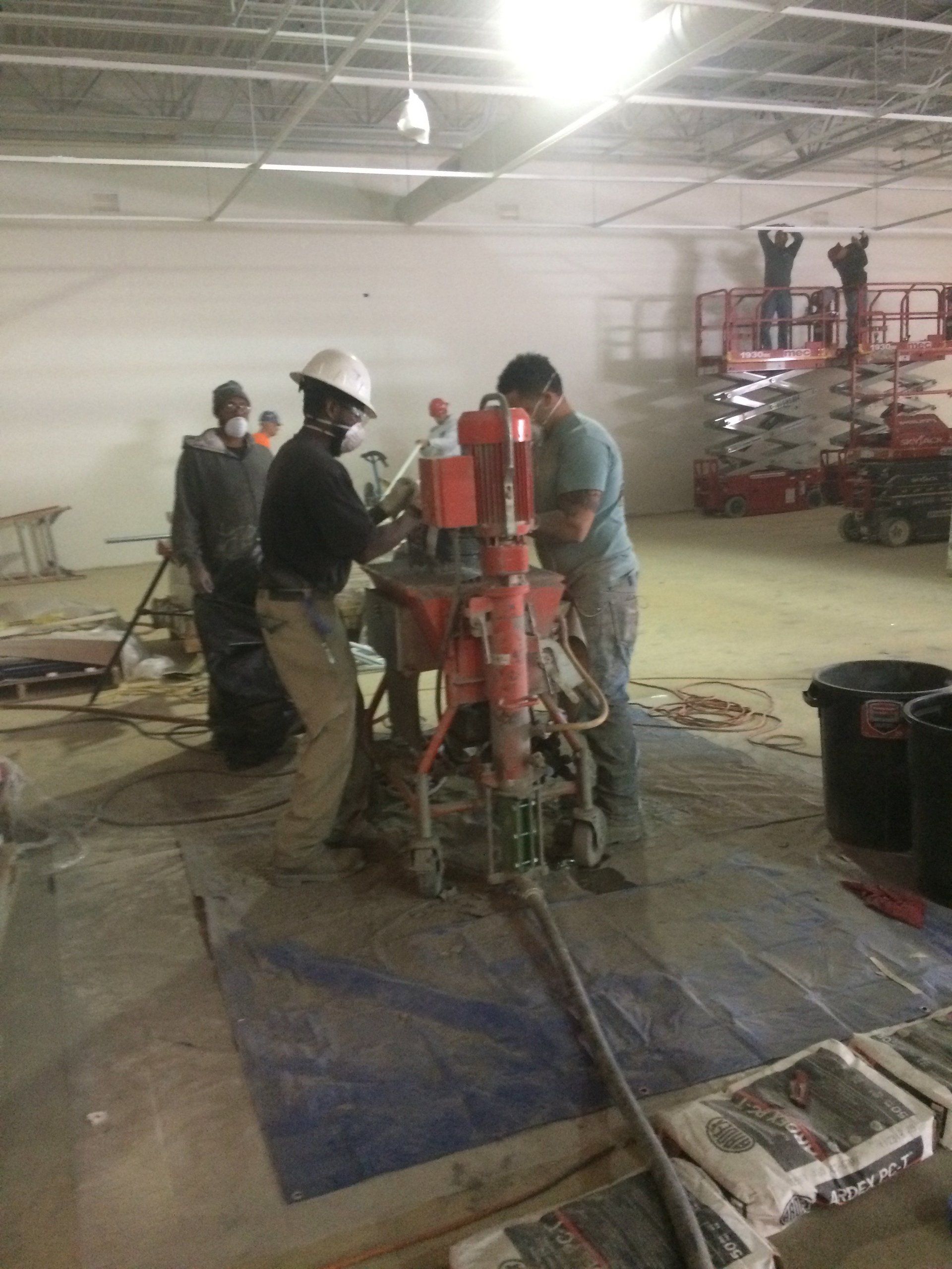 ARDEX engineered cement floor topping; concrete floor restoration