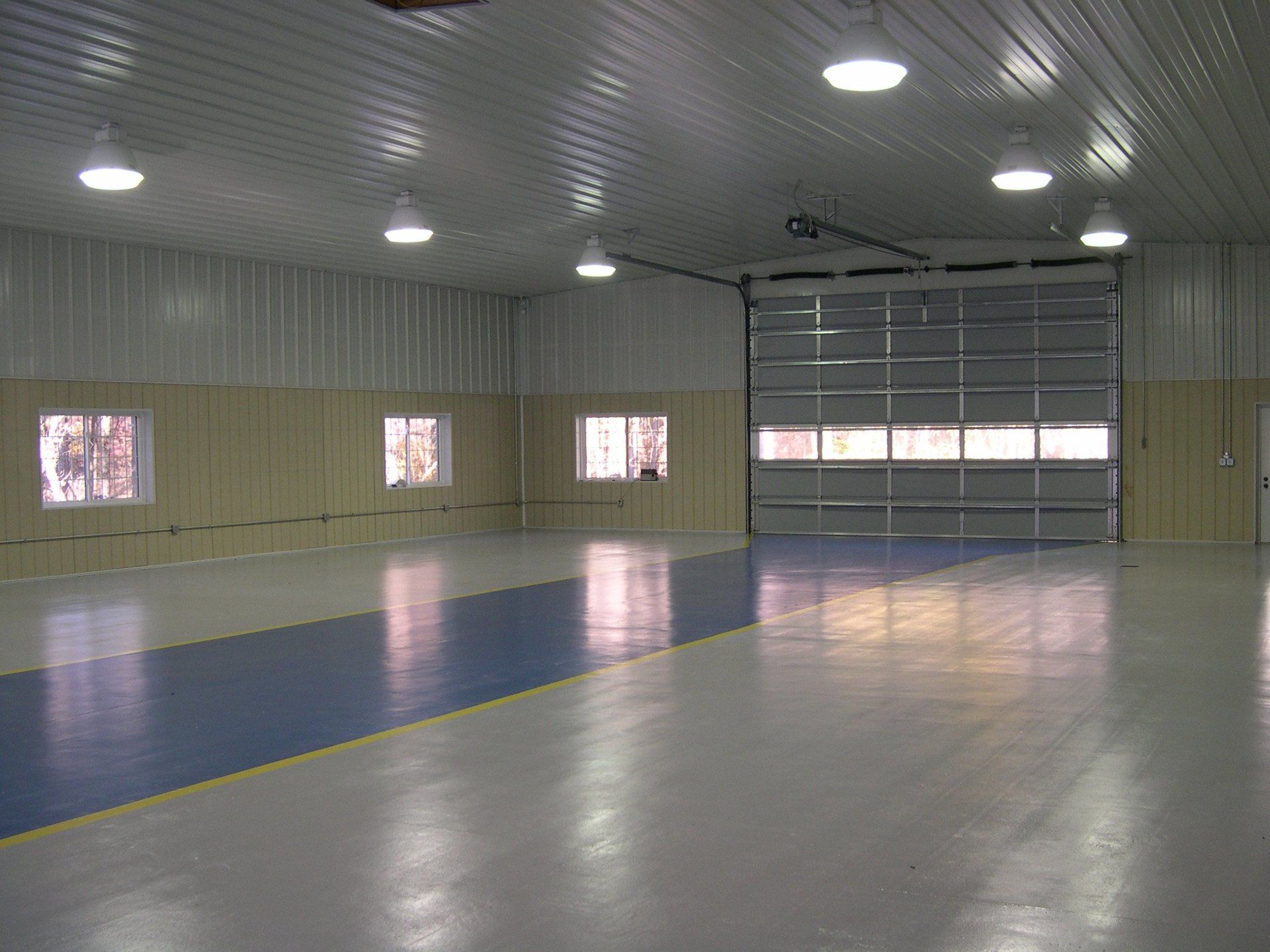 shotblasted concrete floor with epoxy coating and traffic lines