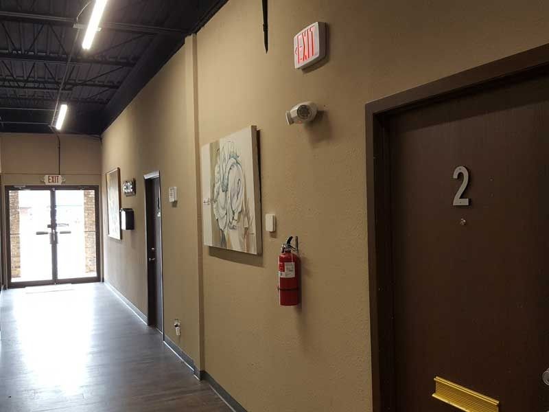 A hallway with the number 2 on the door