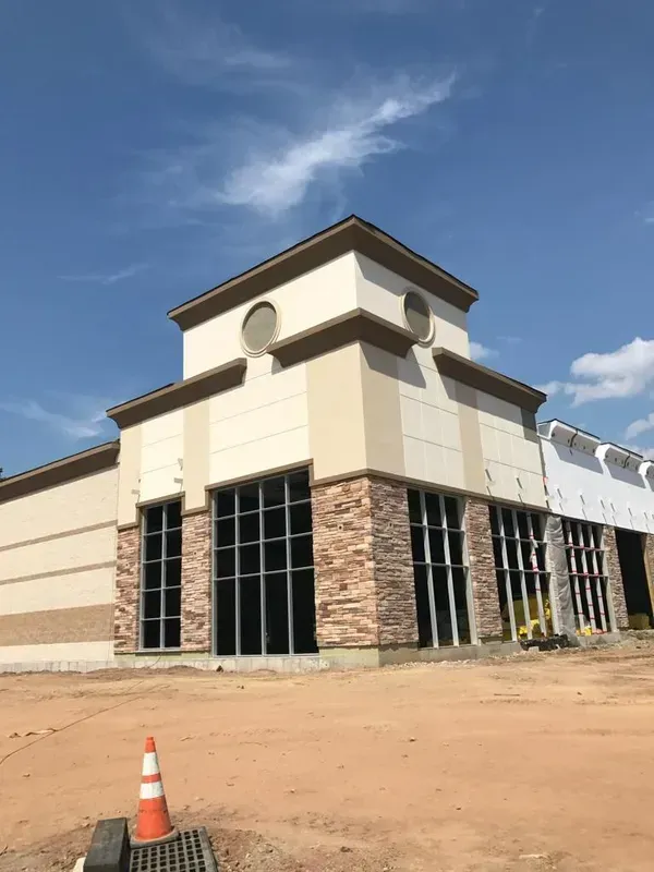 plaster and stonework on commercial building