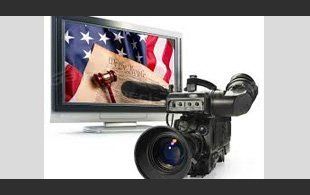 A camera and a television on a white background