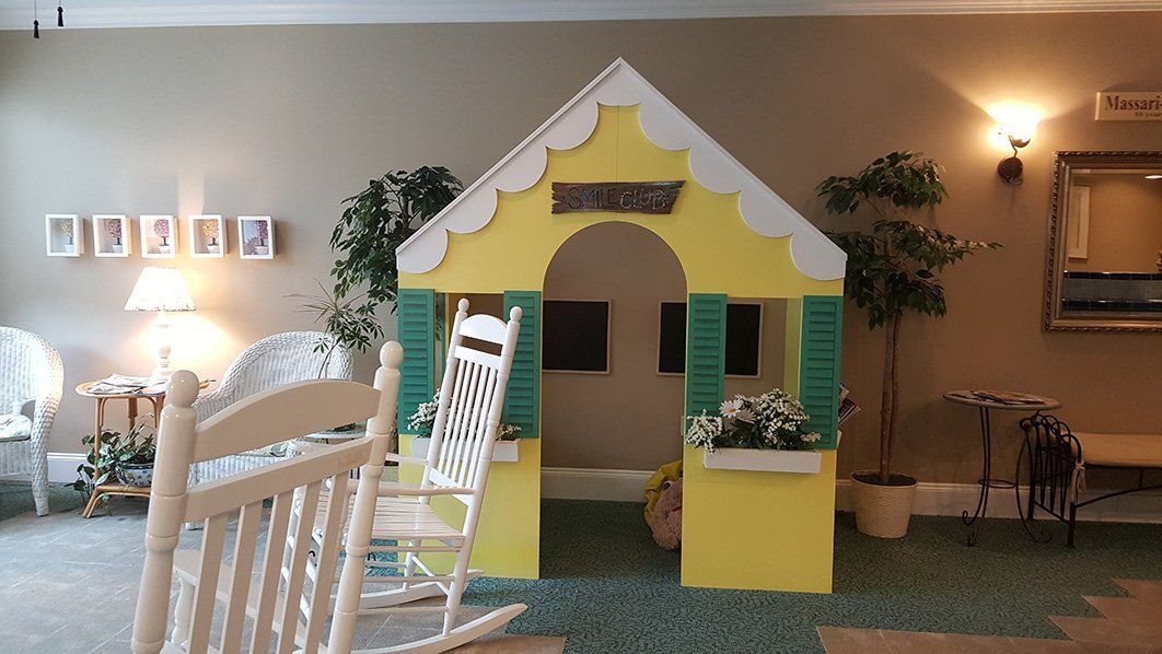 a yellow and green playhouse
