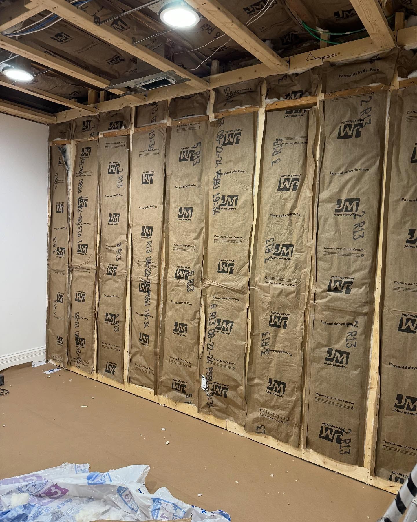 A room with a lot of insulation on the walls and ceiling.