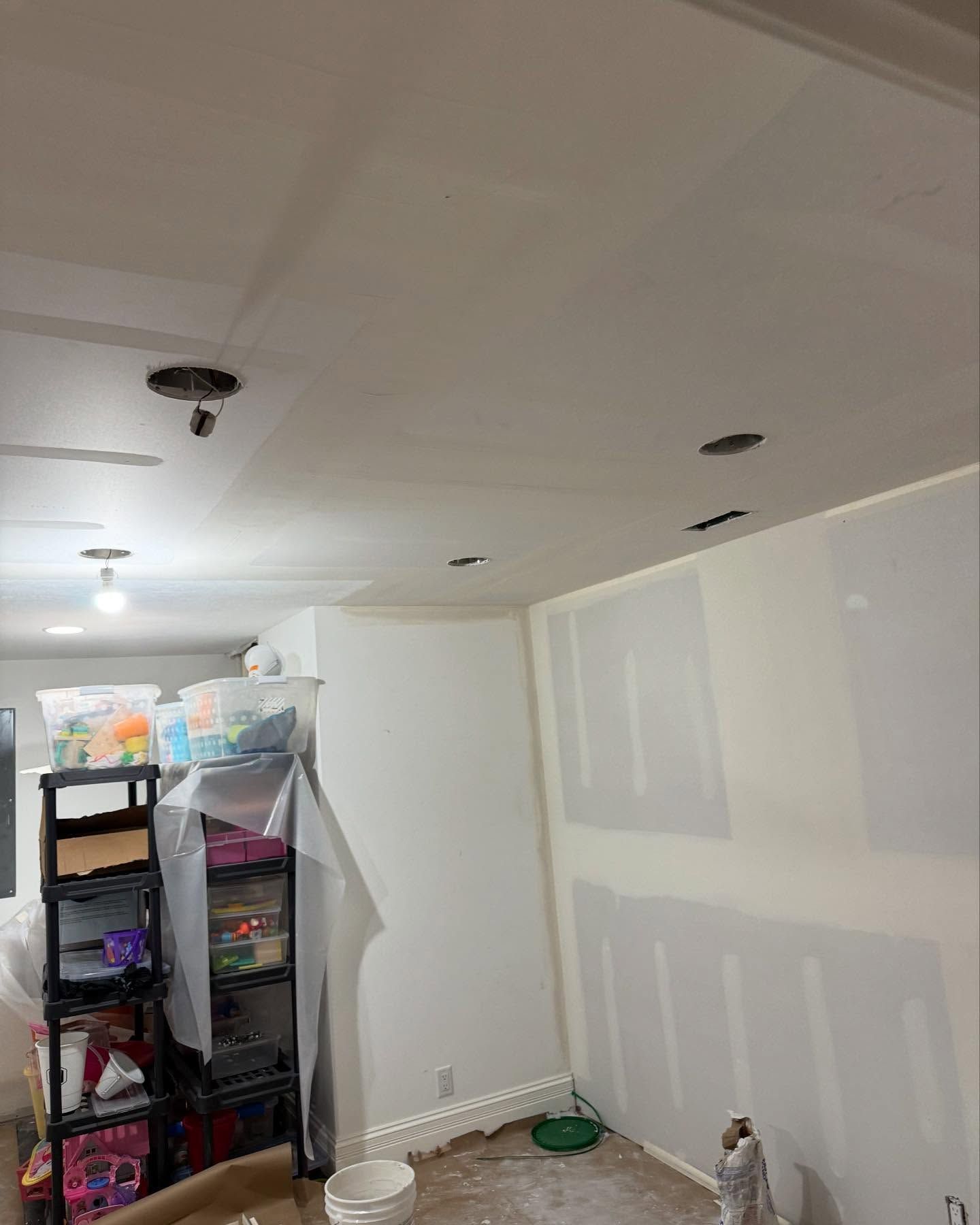 A room with a ceiling that is being remodeled.