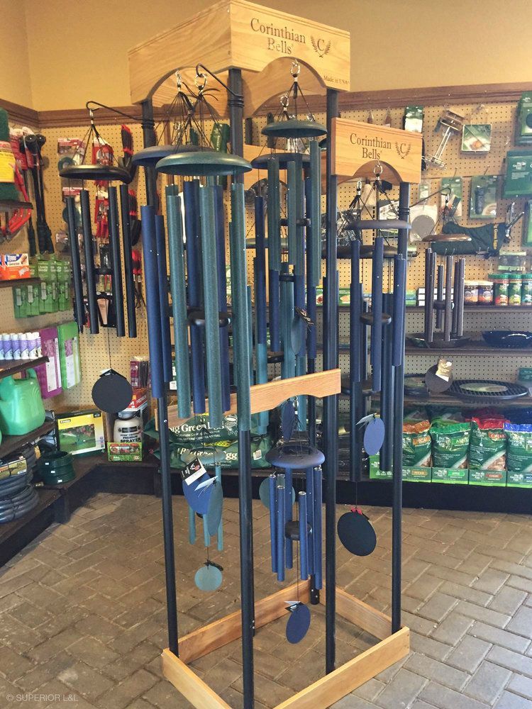 A bunch of wind chimes are on display in a store